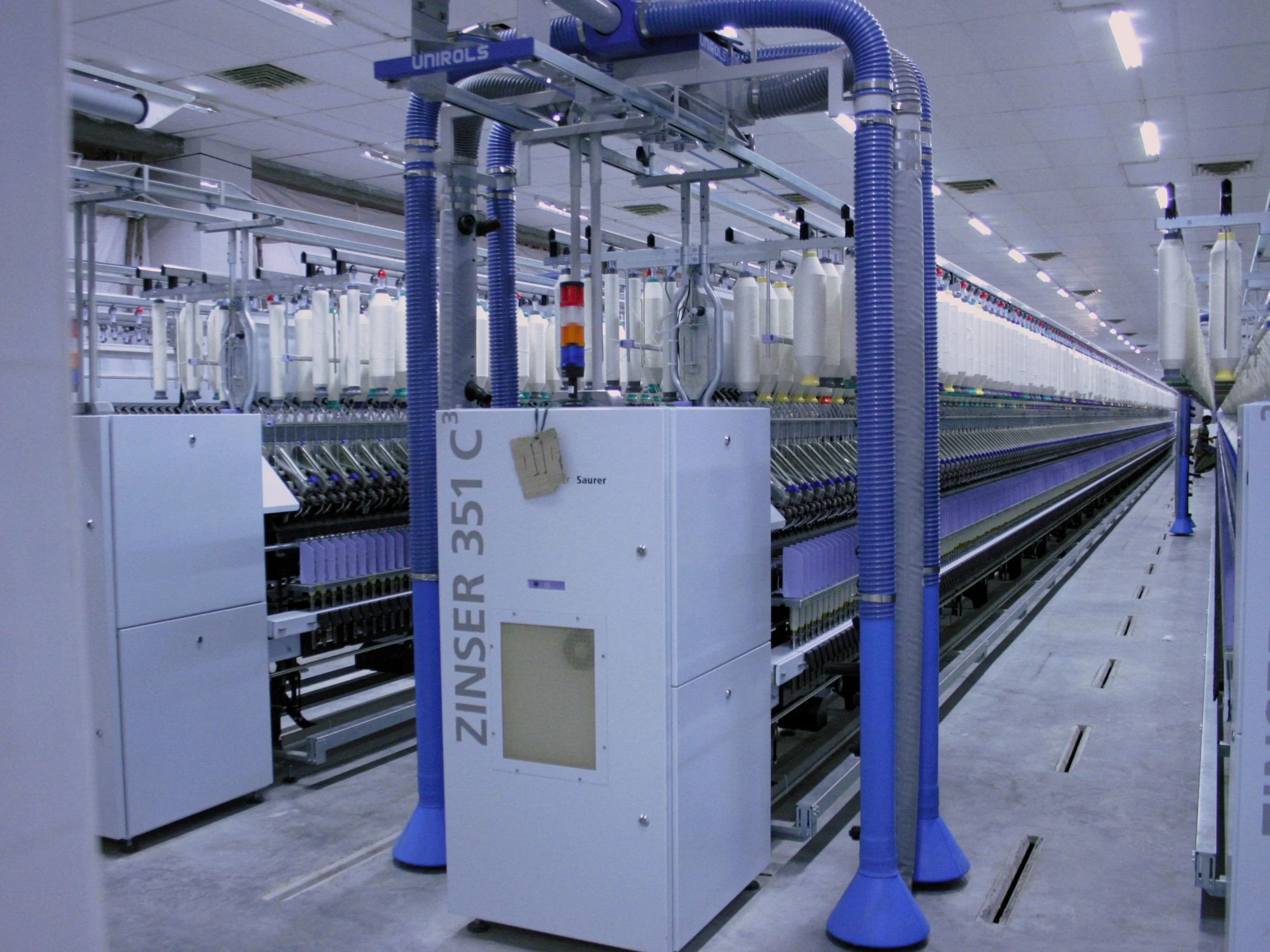 Overhead travelling cleaner - for spinning units - Belt driven travelling cleaner